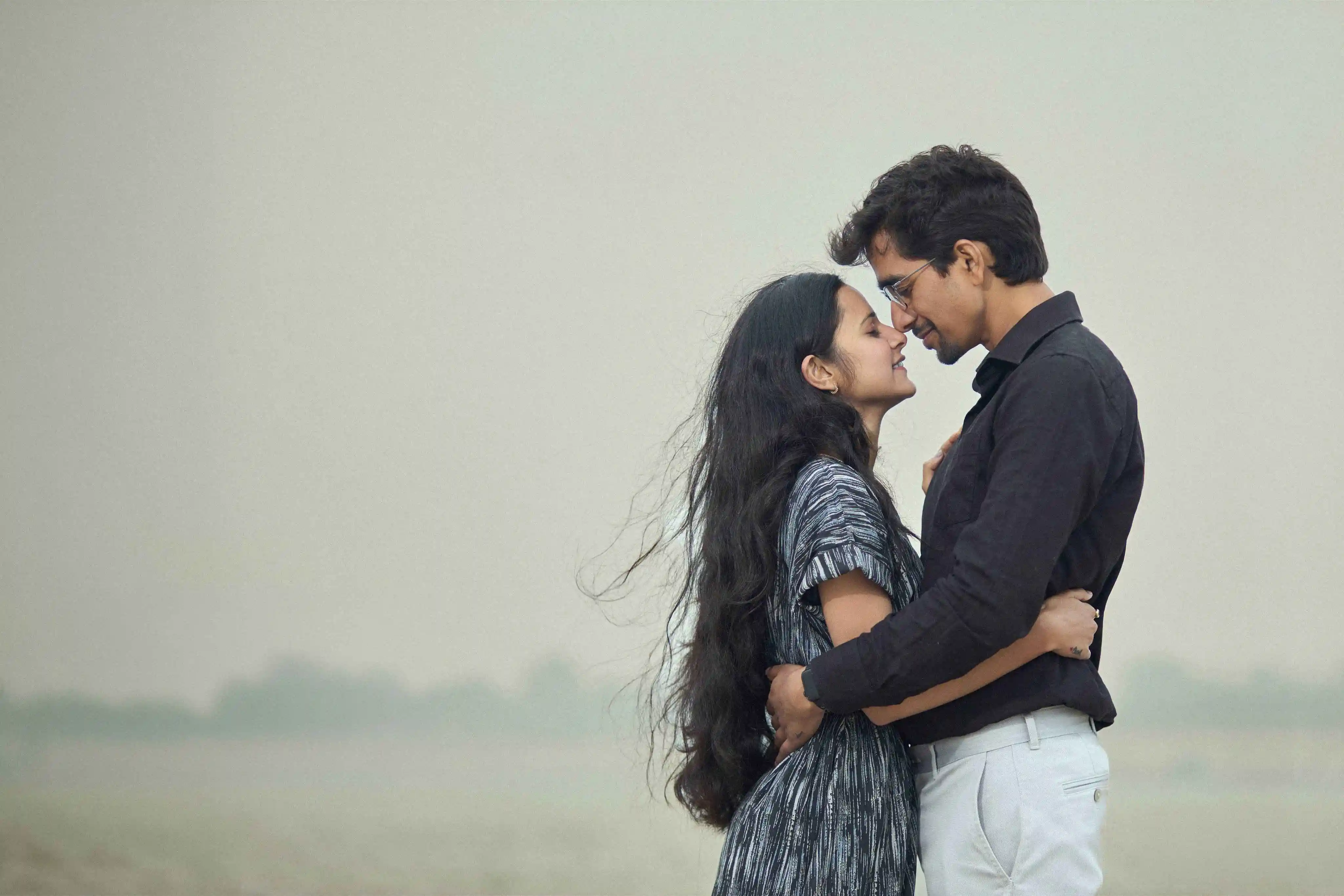 Candid wedding photographer in Varanasi capturing romantic couple moment